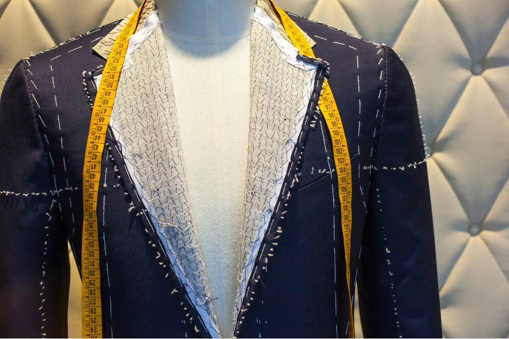 A jacket with a measuring tape design, perfect for fashion-forward individuals who appreciate unique details.